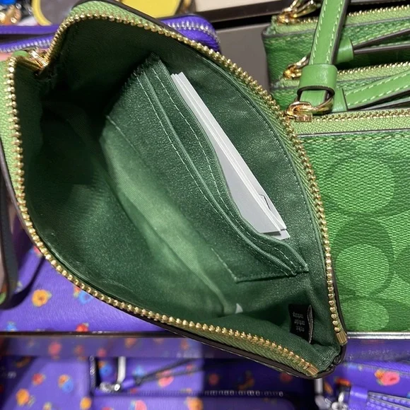 Coach Corner Zip Wristlet In Signature Canvas 
Im/Neon Green - Picture 7 of 16